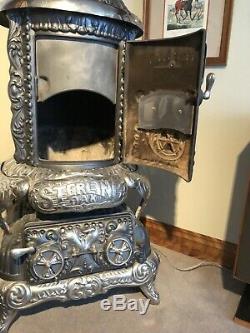 Sterling Oak Cast Iron Wood Burning Parlor Stove. Beautifully Restored